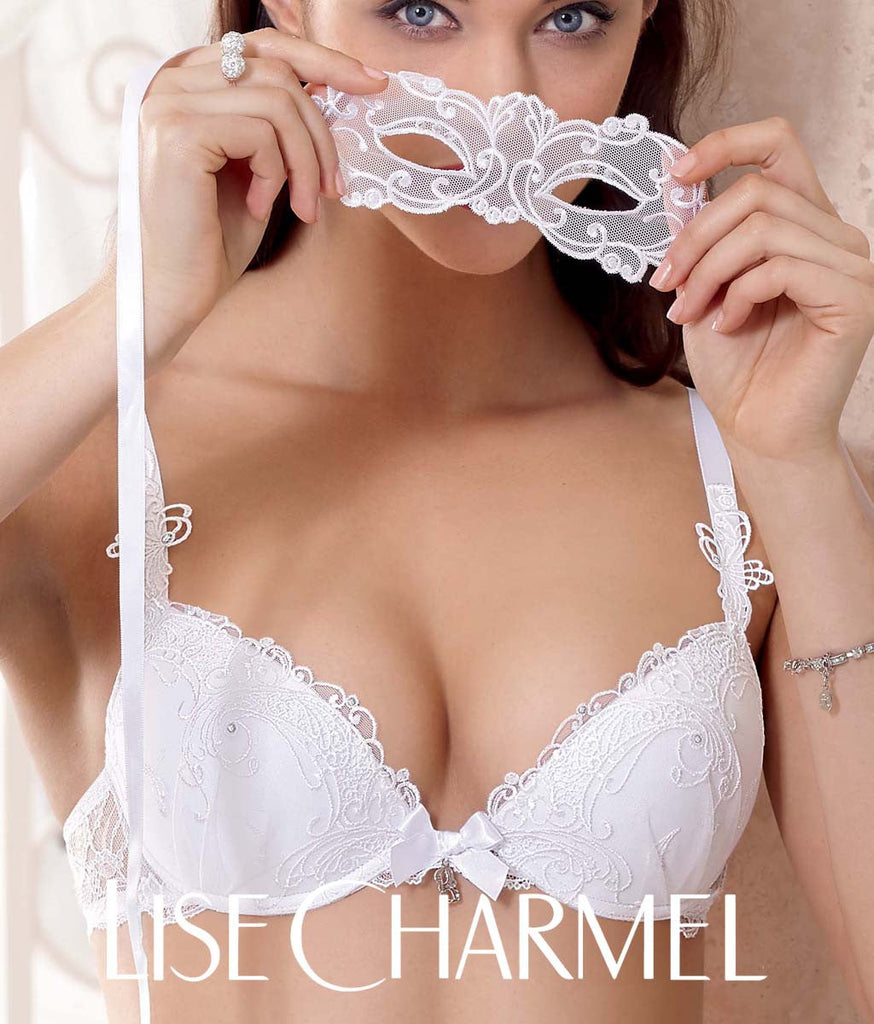 Model wearing white Lise Charmel 'Soir de Venise' lingerie in white