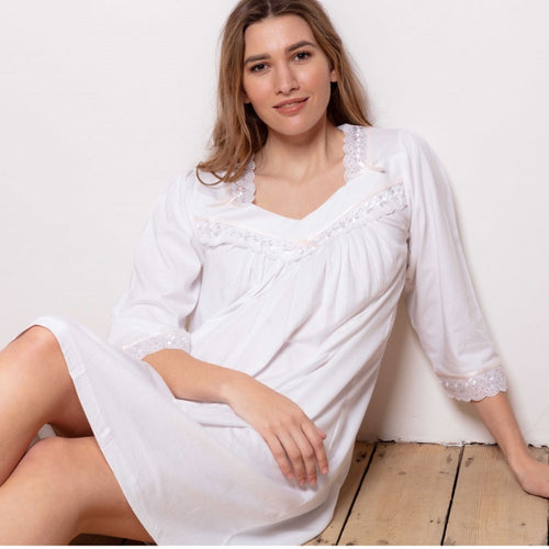 Model wearing 'Ade' Cotton Jersey Mid-Sleeve Nightdress in White, by Cottonreal.