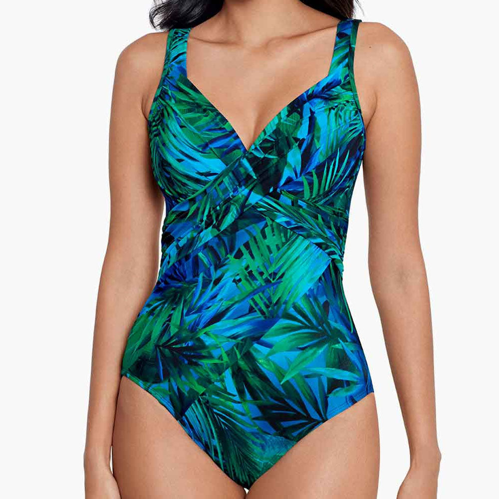 Model wearing Palm Reeder collection 'Revele' Swimsuit in Blue & Green, by Miraclesuit.