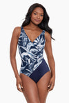 Model wearing 'Oceanus' Swimsuit in Midnight Blue & White, from the Tropica Toile collection by Miraclesuit.