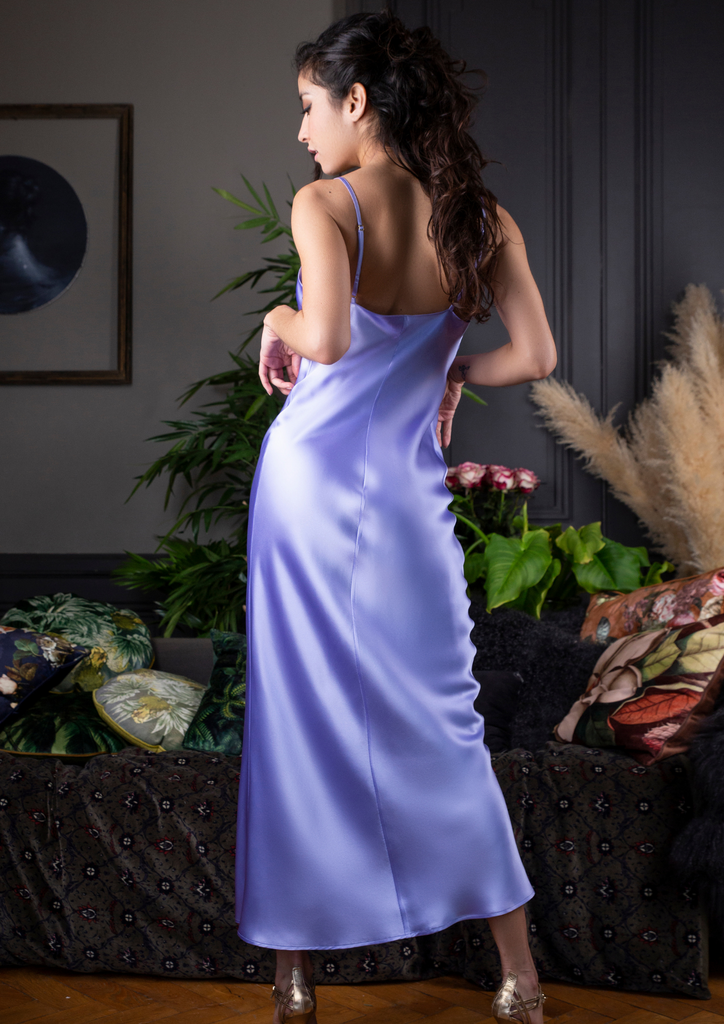 Model wearing silk nightwear in lavender by Marjolaine.