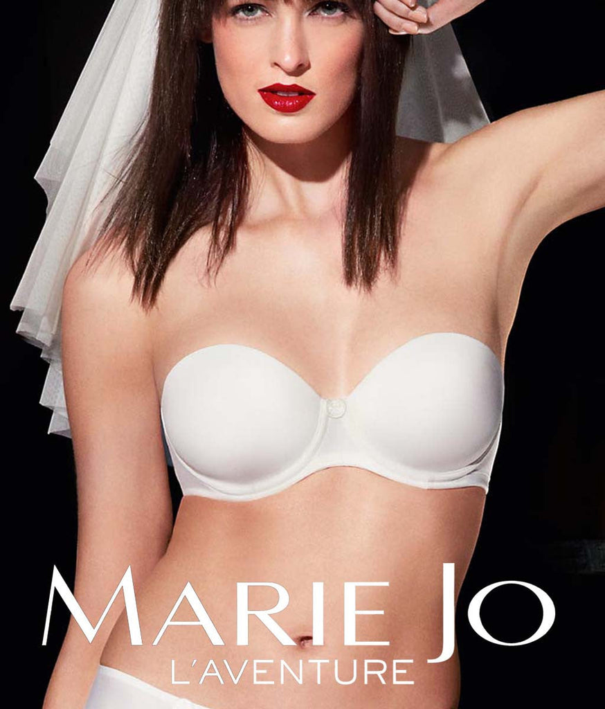Model wearing 'Tom' lingerie in White, by L'Aventure, part of the Marie Jo family.
