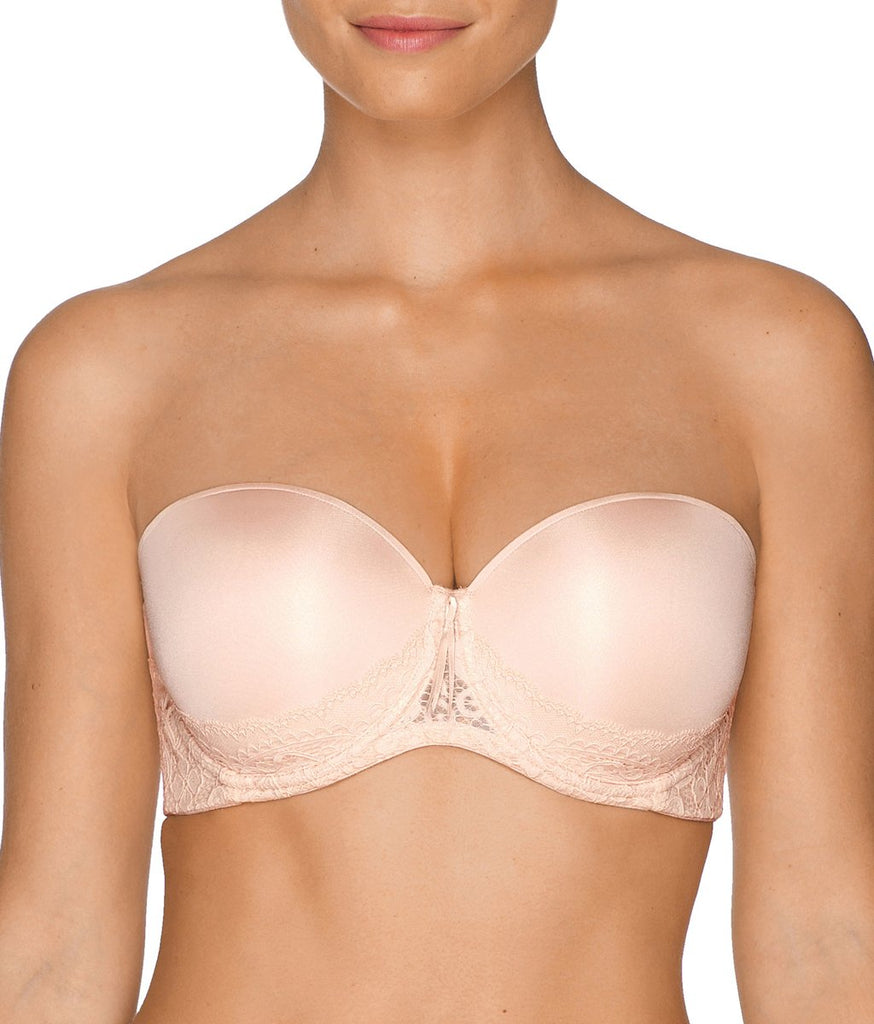 A cream coloured strapless bra