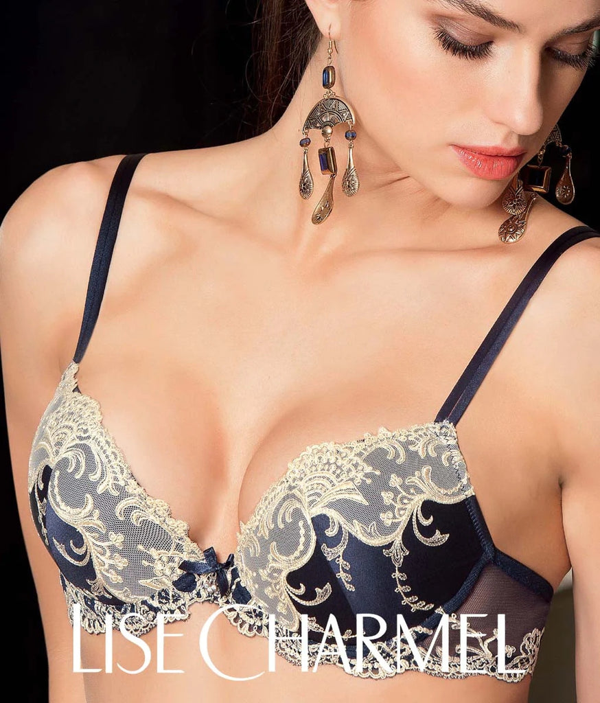 Model wearing 'Splendeur Soie' bra in Marine (Midnight Blue), by Lise Charmel.