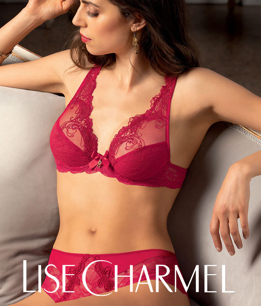 Model wearing Soir de Venise lingerie in Rouge, by Lise Charmel.