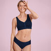 Model wearing 'Lynn' Dark Blue Post-Mastectomy Bra, by Anita (front view).