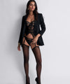 Model wearing 'After Hours' Black Basque, by Aubade (front view).