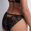 Model wearing 'After Hours' Black Italian Brief, by Aubade (back view, close up).