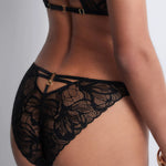 Model wearing 'After Hours' Black Italian Brief, by Aubade (back view, close up).