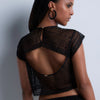 Model wearing 'By The Sea' Black Tank Top, by  Aubade (back view, close up).