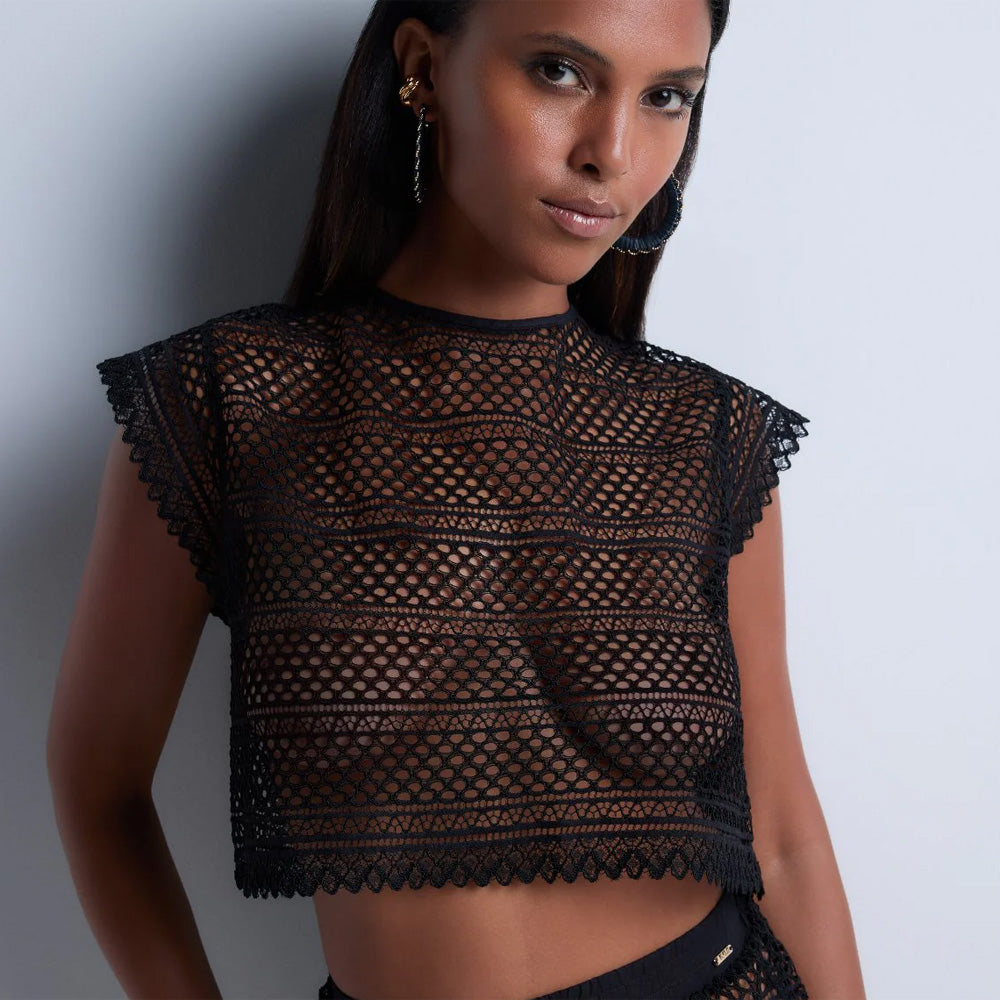 Model wearing 'By The Sea' Black Tank Top, by  Aubade (front view, close up).