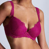Model wearing 'Danse des Sens' bra in dark fuchsia, by Aubade.