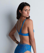 Model wearing 'Love Soul' Blue Push-Up Bra, by Aubade (back view).