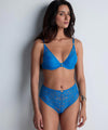 Model wearing 'Love Soul' Blue Push-Up Bra, by Aubade (front view).