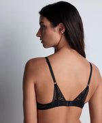 Model wearing 'Love Soul' Black Push-Up Bra, by Aubade (back view).