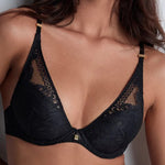 Model wearing 'Love Soul' Black Push-Up Bra, by Aubade (front view, close-up).