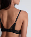 Model wearing 'Love Soul' Black Plunge Triangle Bra, by Aubade (back view).