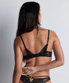 Model wearing 'Love Soul' Black Comfort Full Cup Bra, by Aubade (back view).