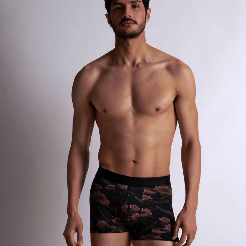 Model wearing 'Blurred Flowers' Boxer Shorts by Aubade (front view).