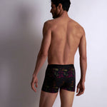 Model wearing 'Fleurs Magiques' Boxer Shorts by Aubade (back view).
