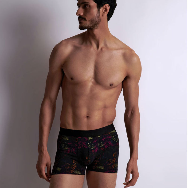 Model wearing 'Fleurs Magiques' Boxer Shorts by Aubade (front view).