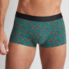 Model wearing 'Leopards' Boxer Short in Green, by Aubade (front view).