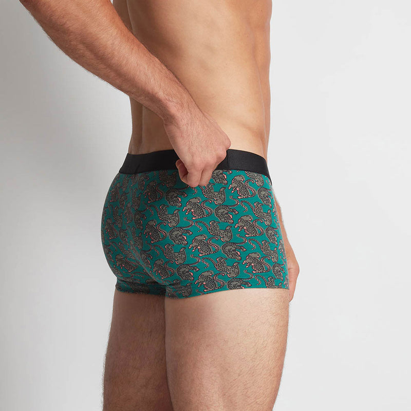 Model wearing 'Leopards' Boxer Short in Green, by Aubade (side view).