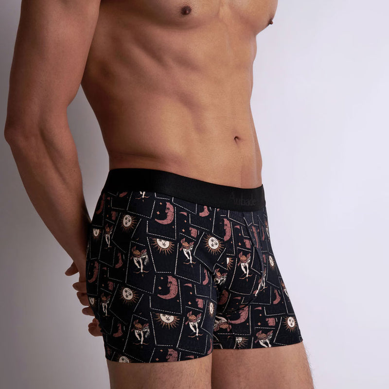 Model wearing 'Tarot' Boxer Short in Black, by Aubade (side view).