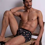 Model wearing 'Tarot' Boxer Short in Black, by Aubade (front view).