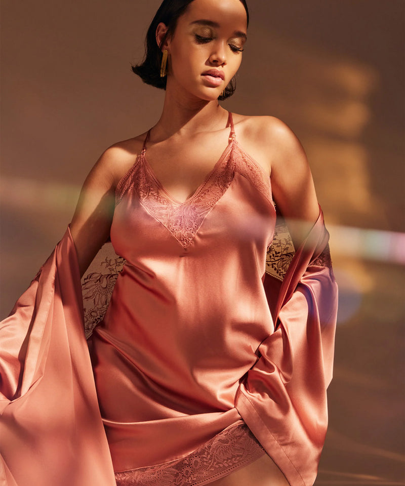 Model wearing 'Midnight Whisper' Warm Pink Silk Nightie, by Aubade (front view).