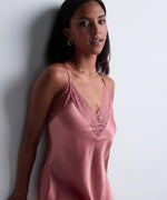 Model wearing 'Midnight Whisper' Warm Pink Silk Nightie, by Aubade (front view).