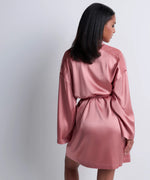 Model wearing 'Midnight Whisper' Warm Pink Silk Kimono, by Aubade (back view).