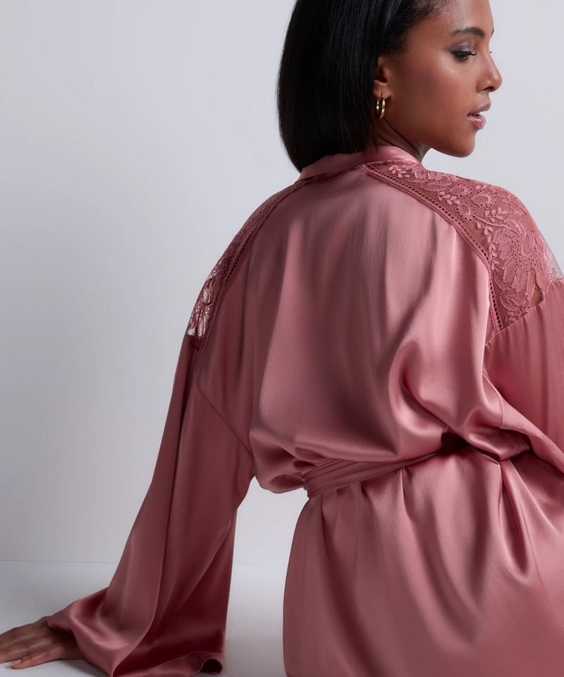 Model wearing 'Midnight Whisper' Warm Pink Silk Kimono, by Aubade (back view).