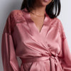 Model wearing 'Midnight Whisper' Warm Pink Silk Kimono, by Aubade (front view, close up).