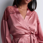 Model wearing 'Midnight Whisper' Warm Pink Silk Kimono, by Aubade (front view, close up).