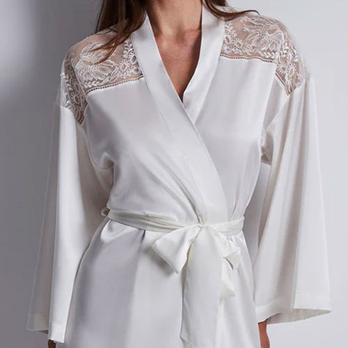 Model wearing 'Midnight Whisper' Opale (Ivory) Silk Kimono, by Aubade (close-up).