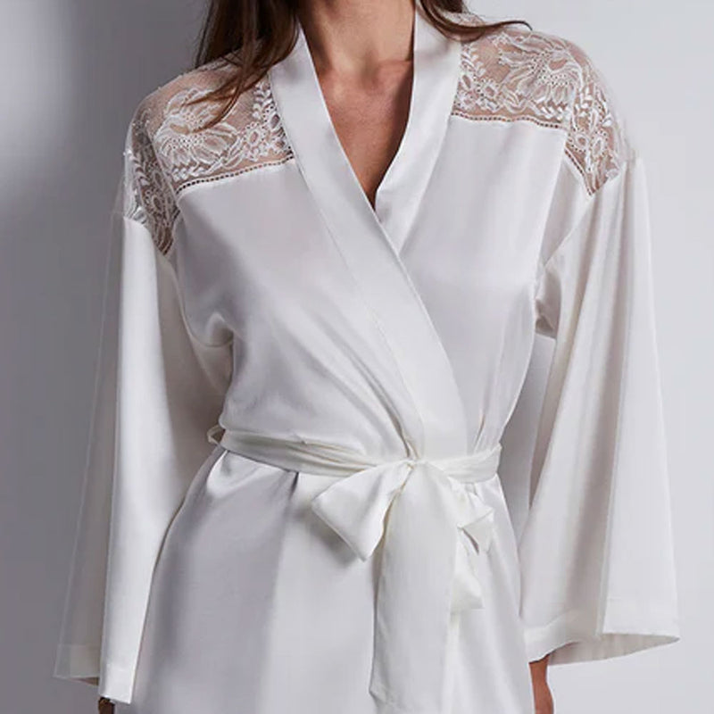 Model wearing 'Midnight Whisper' Opale (Ivory) Silk Kimono, by Aubade (close-up).