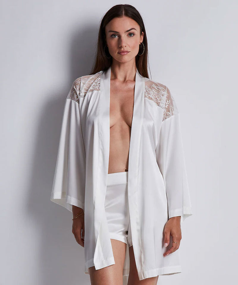Model wearing 'Midnight Whisper' Opale (Ivory) Silk Kimono, by Aubade (front view).