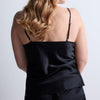 Model wearing 'Midnight Whisper' Black Camisole, by Aubade (back view).