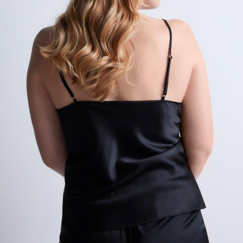 Model wearing 'Midnight Whisper' Black Camisole, by Aubade (back view).