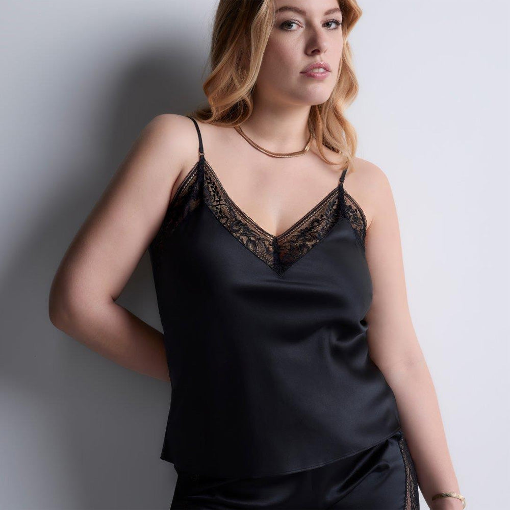 Model wearing 'Midnight Whisper' Black Camisole, by Aubade (front view).