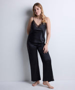 Model wearing 'Midnight Whisper' Black Camisole, by Aubade (front view).