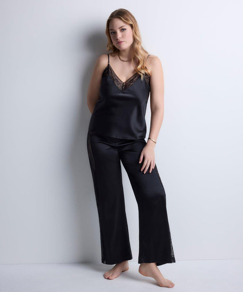 Model wearing 'Midnight Whisper' Black Camisole, by Aubade (front view).