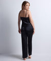 Model wearing 'Midnight Whisper' Black Camisole, by Aubade (back view).