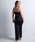 Model wearing 'Midnight Whisper' Black Camisole, by Aubade (back view).