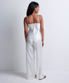 Model wearing 'Midnight Whisper' Opal White Camisole, by Aubade (back view).