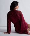 Model wearing 'Midnight Whisper' Crimson Silk Kimono, by Aubade (back view).