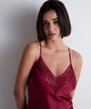 Model wearing 'Midnight Whisper' Crimson Silk Nightie, by Aubade (front view).