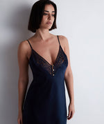 Model wearing 'Midnight Whisper' Midnight Blue Long Silk Nightie, by Aubade (front view, detail).