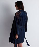 Model wearing 'Midnight Whisper' Midnight Blue Silk Kimono, by Aubade (back view).